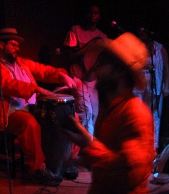 music scene with drums and bell