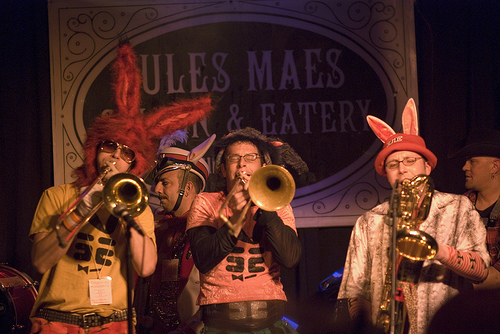 two trombones and baritone sax with bunny ears, rabbit band at honk festival seattle